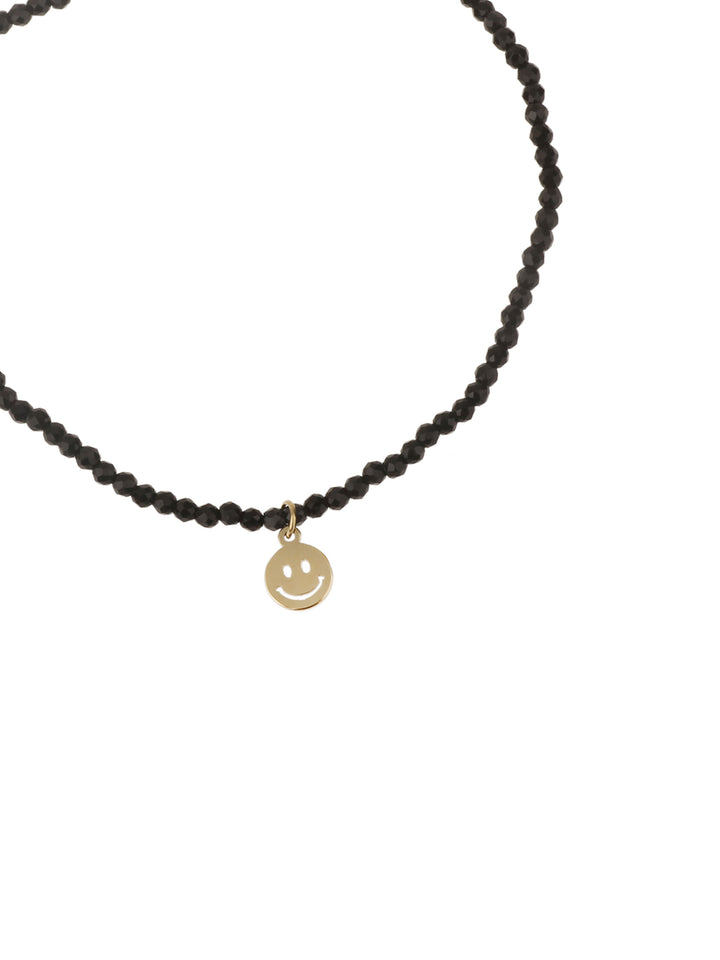 Rose & Camellia bracelet 3958 - Dames Armband - zwart - goud - Smiley - Elastisch - 17 cm