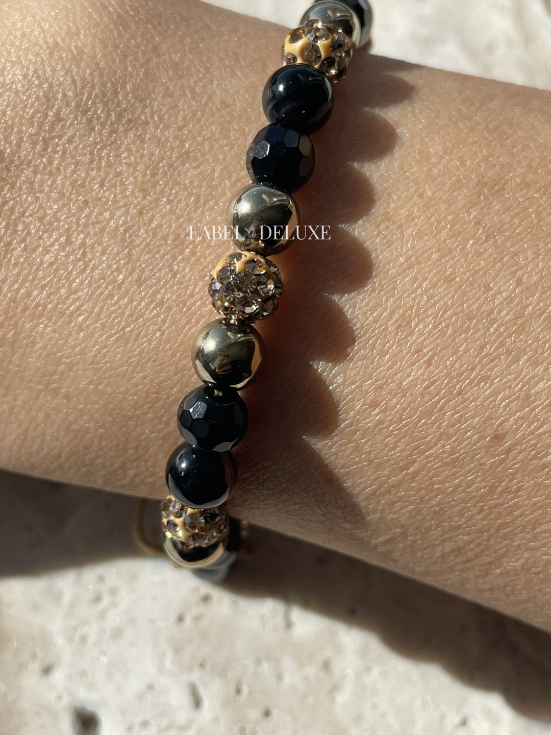 Karma Jewelry 83784 - Kralen Armband Dames - Spiral XS Tuscan Sun - 6 MM - 18.5 + 6 CM - Verstelbaar Goud - zwart